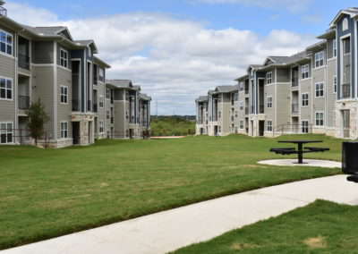 Beautifully landscaped grounds outside the residential buildings at Copper Pointe