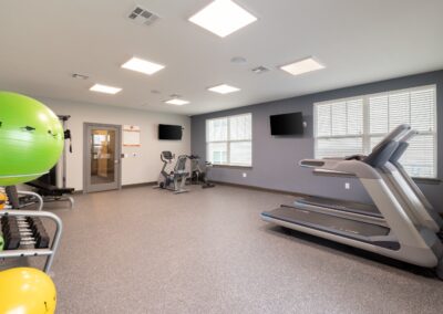 State-of-the-art fitness center with cardio and weight equipment at Copper Pointe Apartments in San Antonio